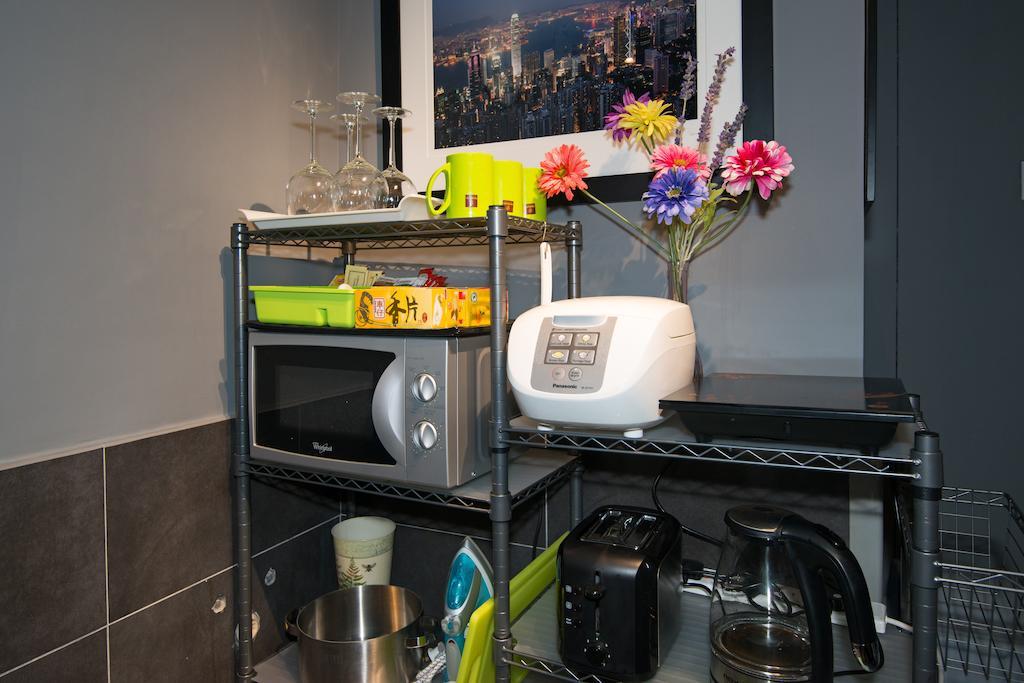 Home Plus Inn Hong Kong Bagian luar foto
